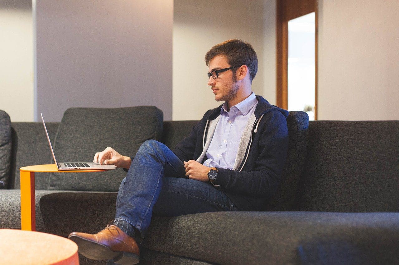 Business sitting in front of a laptop