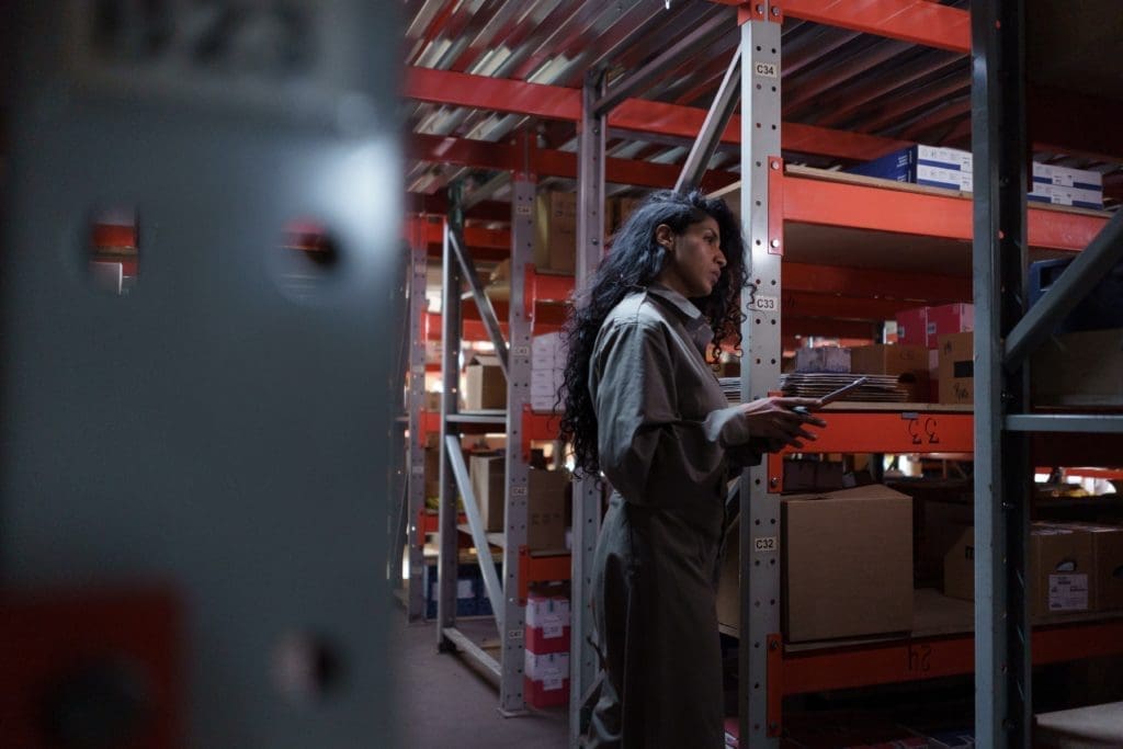 Team member working on inventory in a warehouse