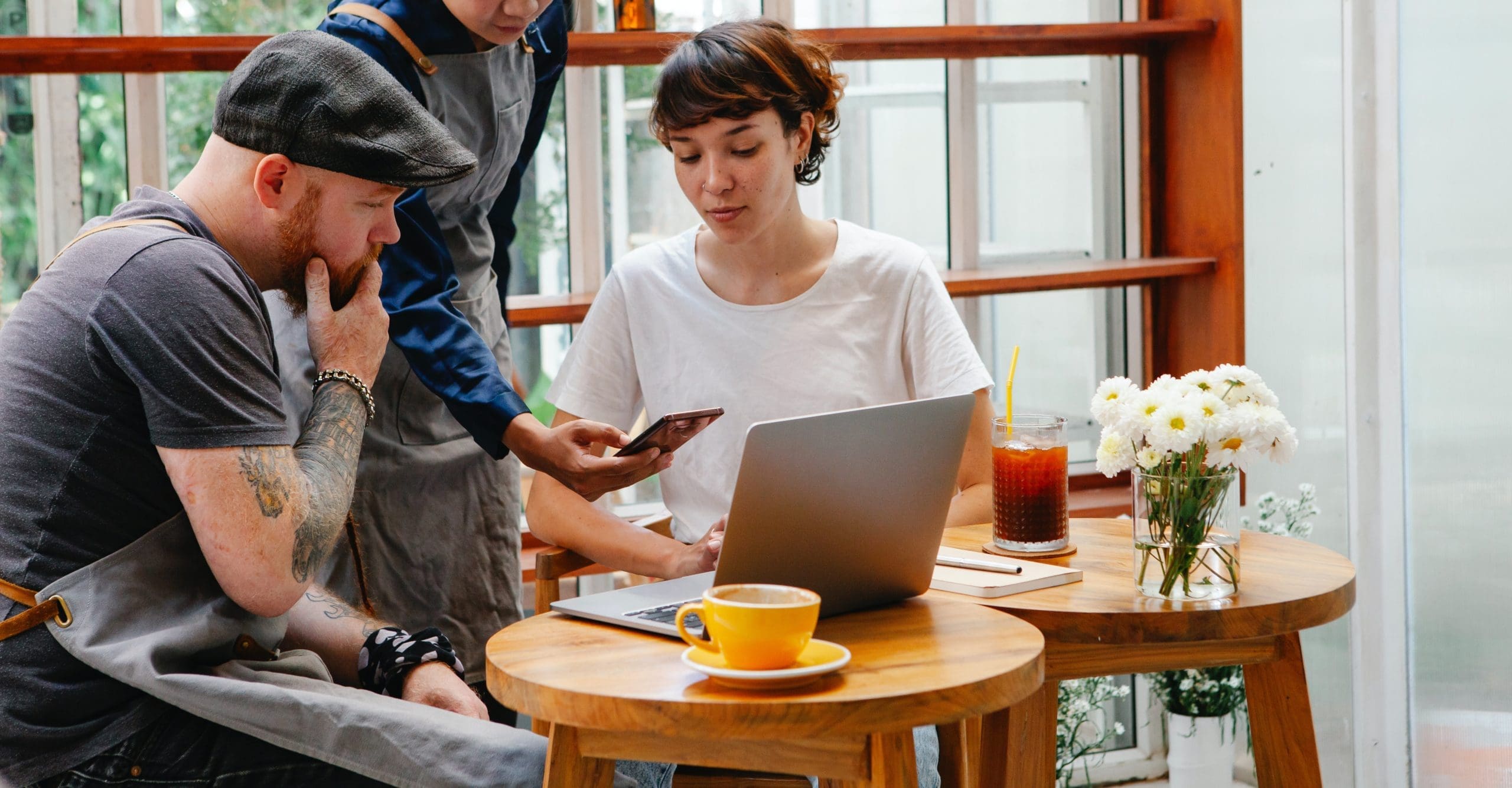 Team members setting up payment reminders in QuickBooks