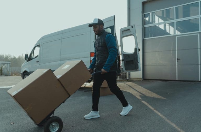 Crew member working on items for shipment