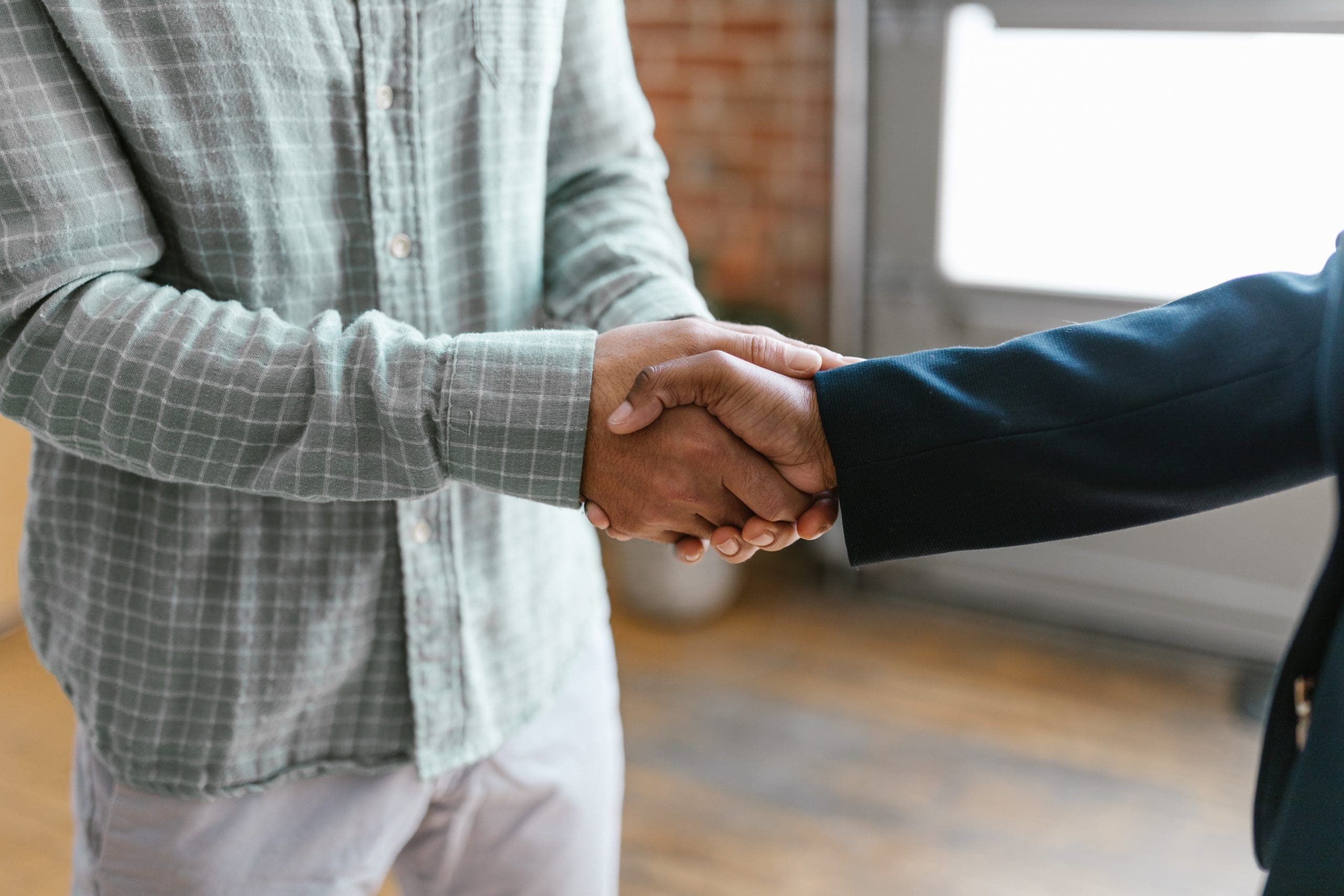 Business owner shaking hands with a vendor