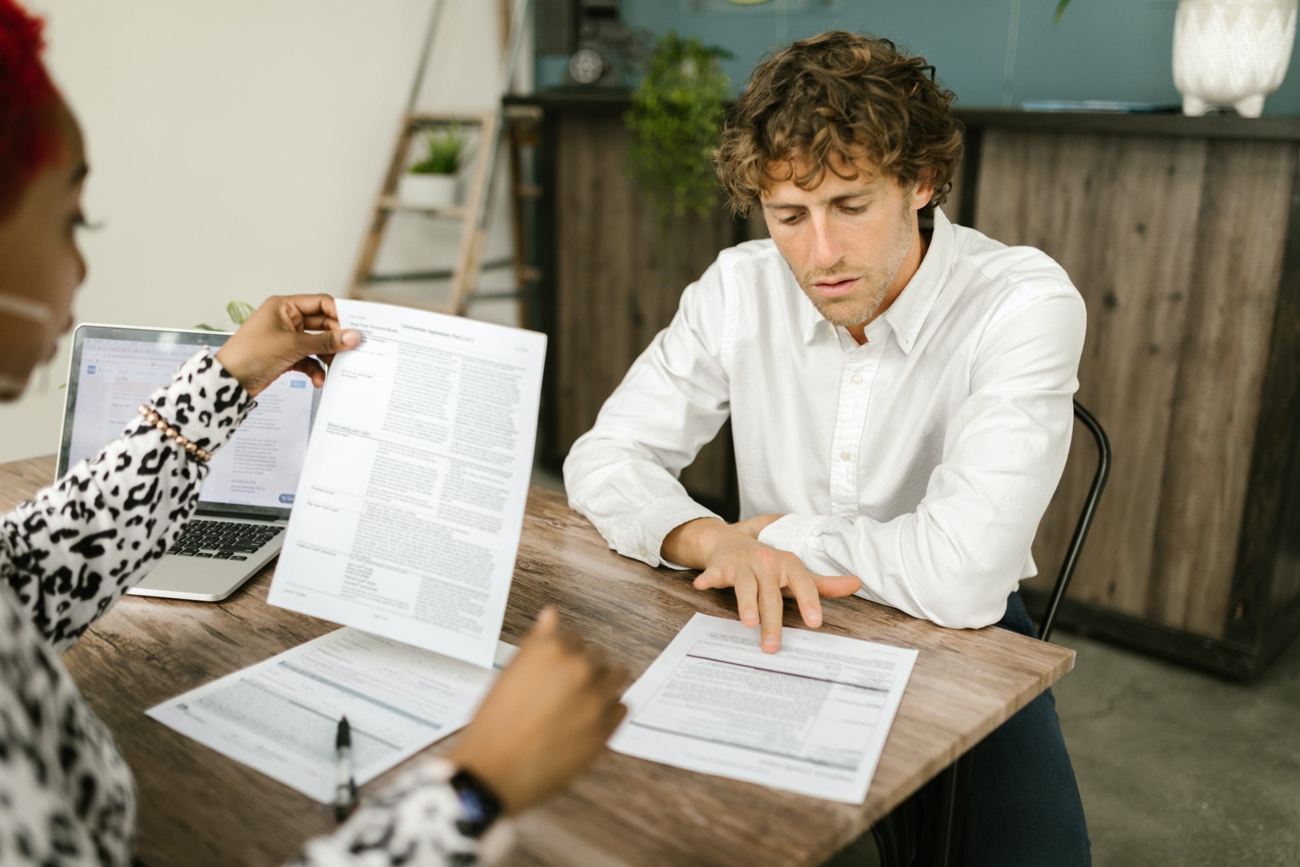 Business owner and accountant exploring 1099 forms in QuickBooks