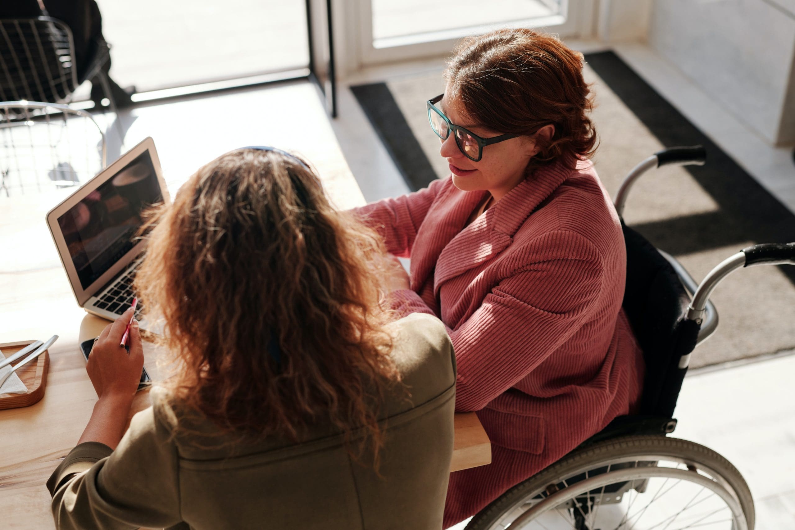 Team members managing purchase orders in QuickBooks