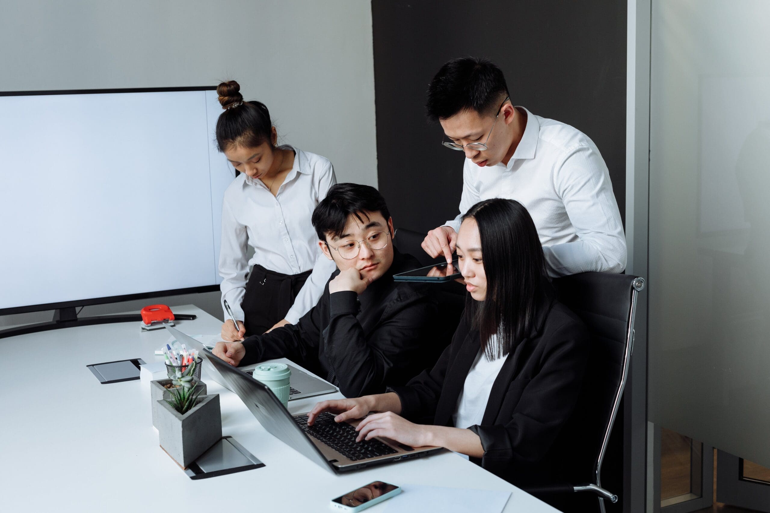 Team members deciding whether to move to QuickBooks Enterprise