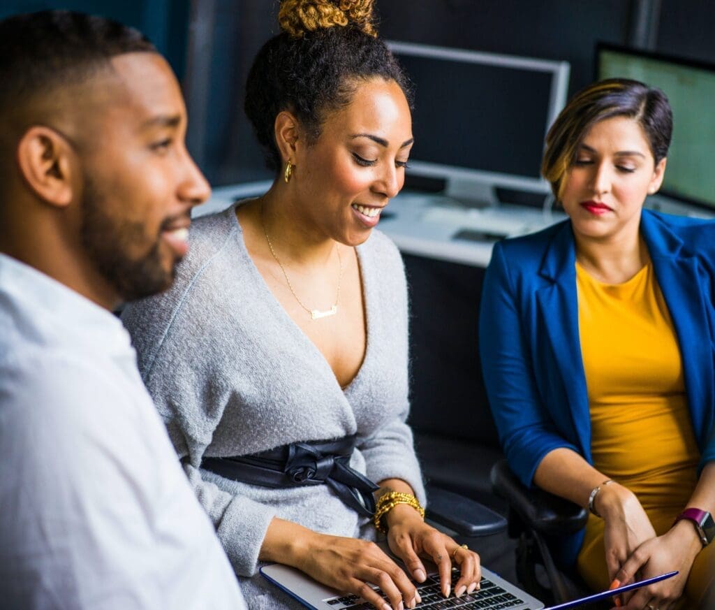 Business owners exploring how to save money with QuickBooks Online Payments