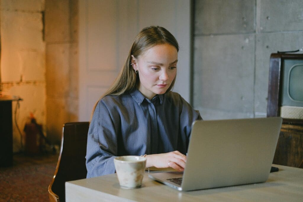 Woman checking out the features of QuickBooks Online Advanced