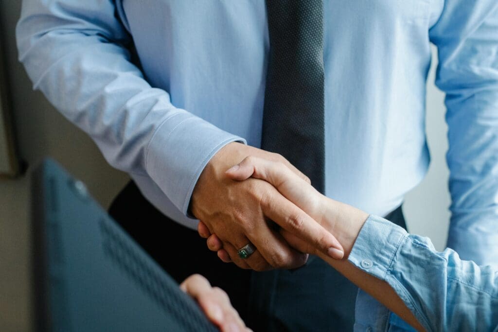 Two businessmen shaking hands