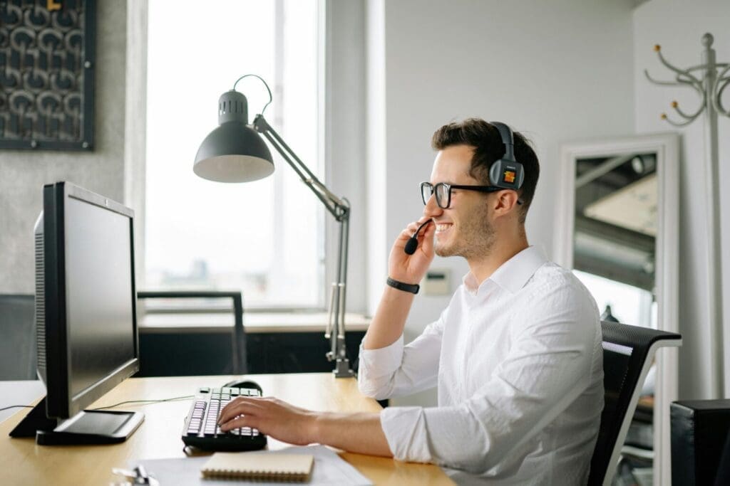 Customer support agent assisting someone over the phone