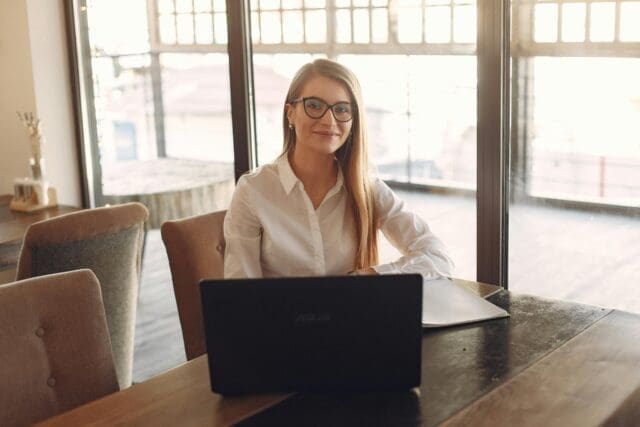 Business woman happily smiling