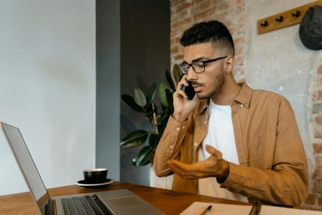 Man talking to someone over the phone