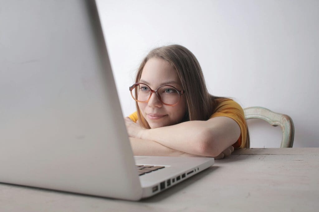 Woman staring at her laptop